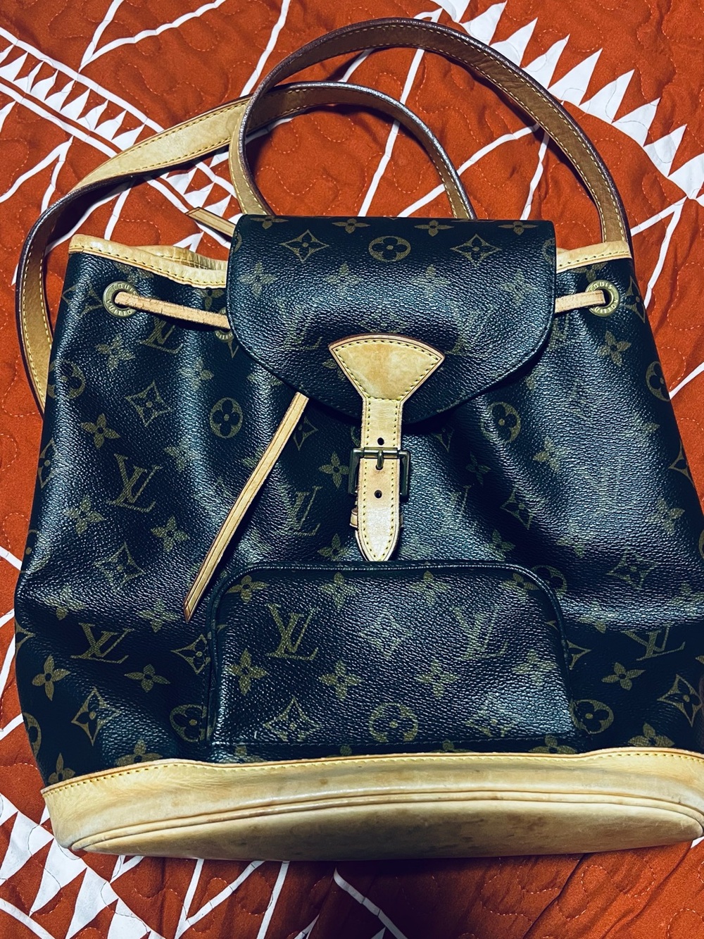 Louis Vuitton Monogram Canvas Drawstring Backpack in Brown and Tan